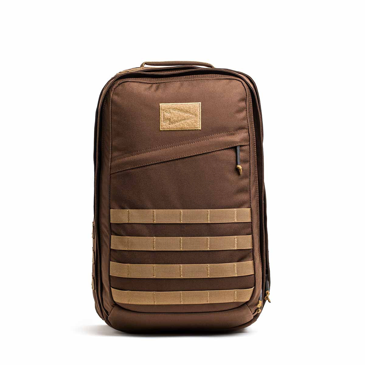 The GR2 - Ballistic Nylon Cordura is a rugged brown tactical travel bag with beige straps and a zippered front pocket, stands upright on a white background, and is carry-on compliant for your next adventure.