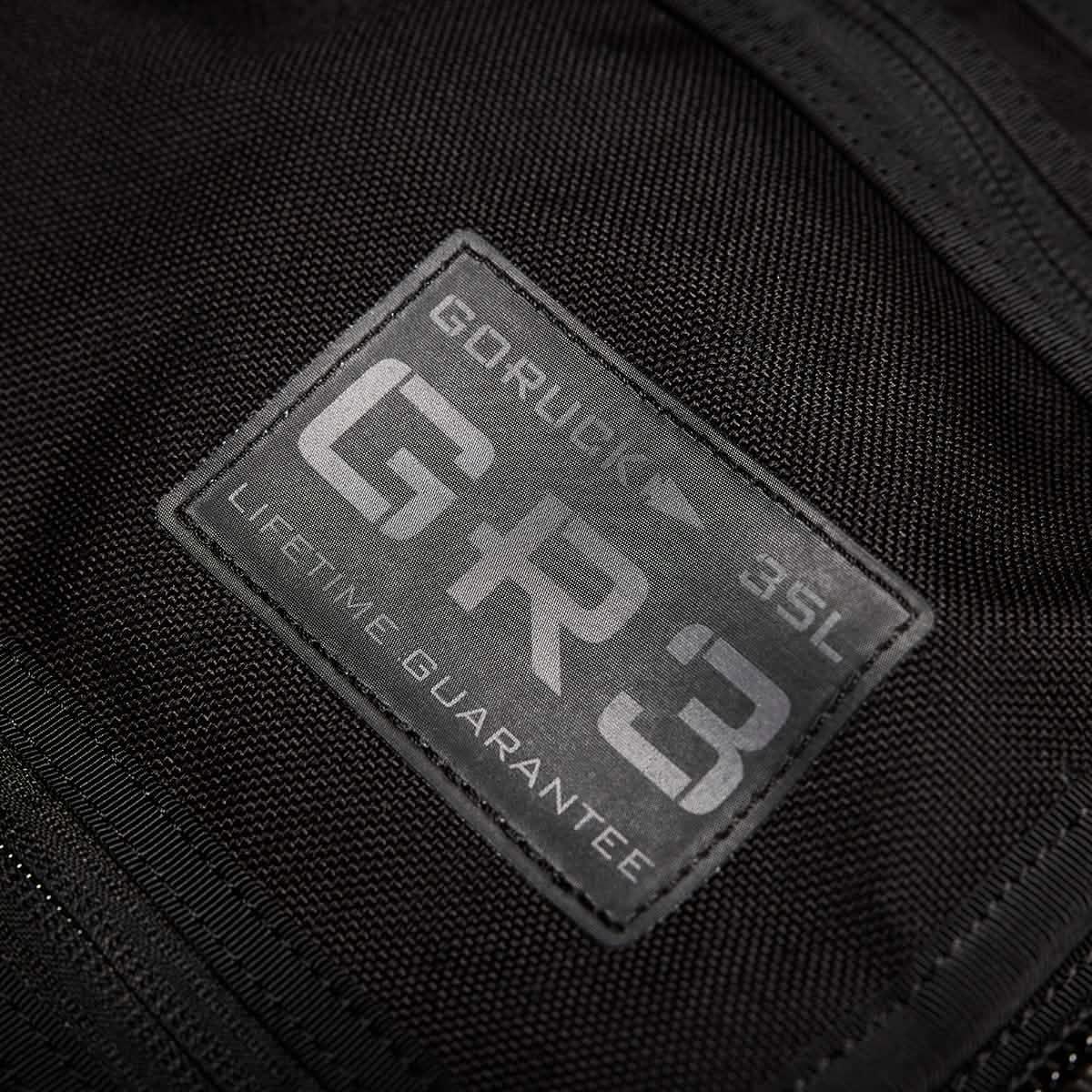 GORUCK GR3 35L black rucksack patch with lifetime guarantee label close-up