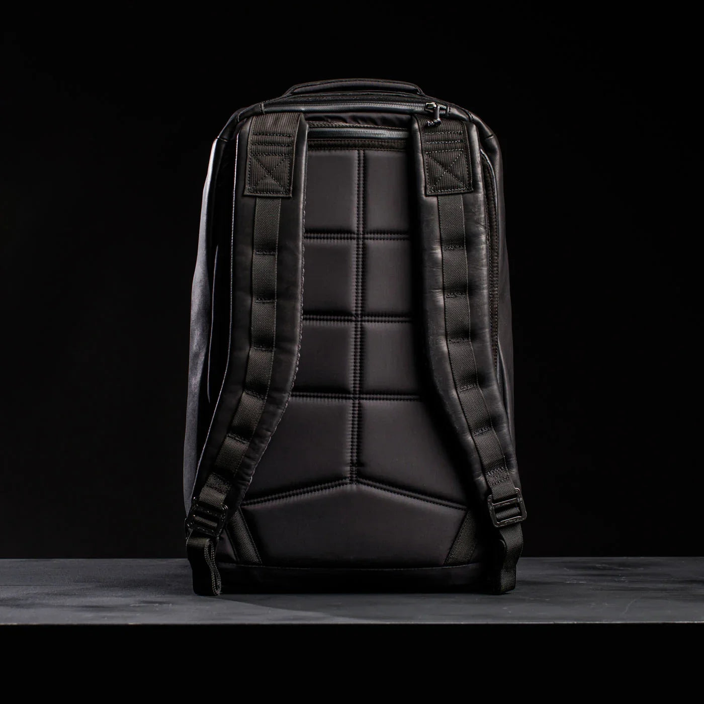The GR1 USA x Carryology - Berserker Viking backpack, with padded straps and back panel, stands upright against a dark background, embodying Norsemen inspiration and the spirit of Viking warriors.