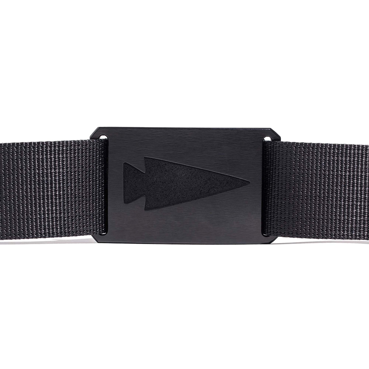 The Spearhead Web Belt is a black nylon minimalist belt with a rectangular black buckle engraved with an arrowhead. Made in the USA by GRIP6, it combines style and durability for everyday wear.