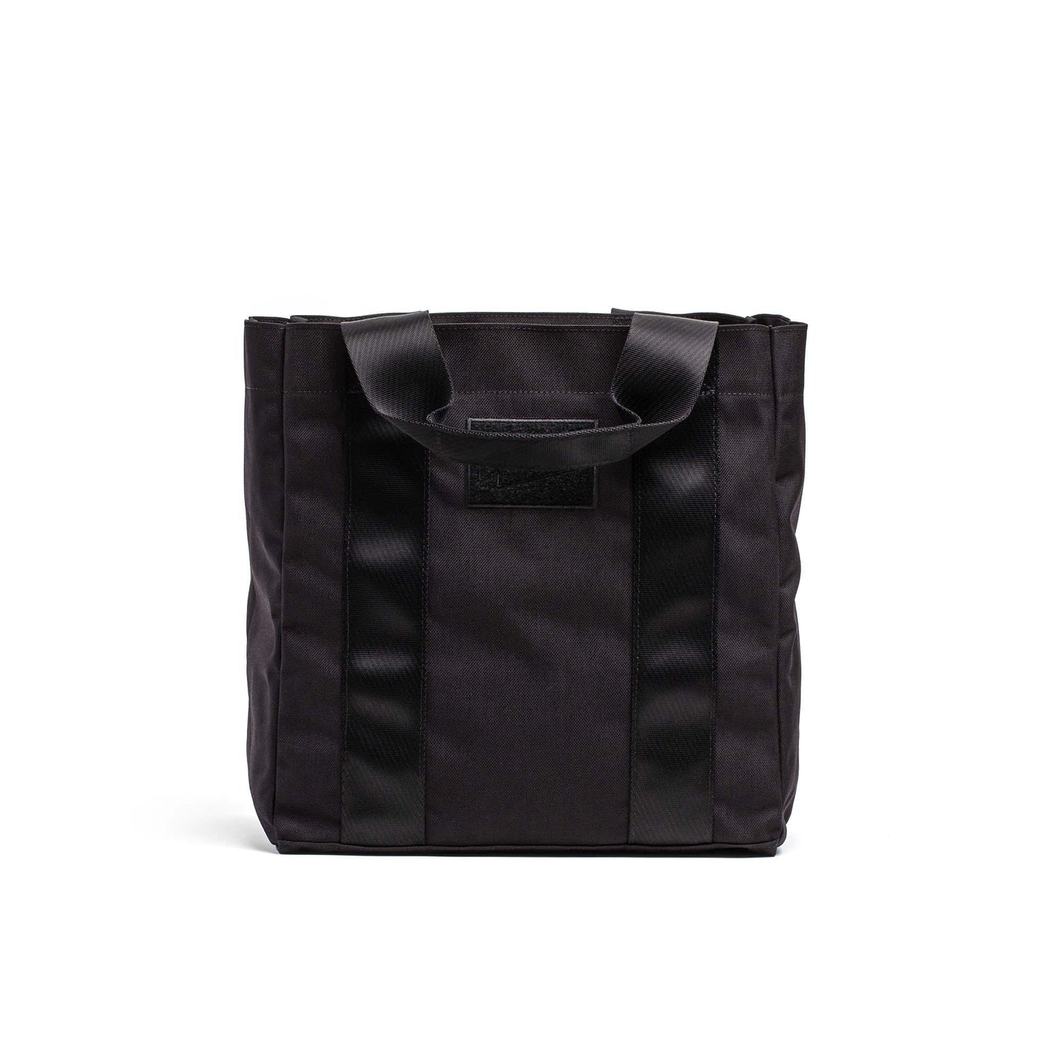 Black durable GORUCK Grocery Getter bag with sturdy handles, designed for tough rucking and heavy-duty use