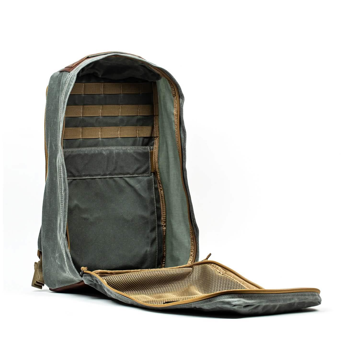 Open GORUCK Heritage GR126L rucksack with charcoal and brown waxed canvas interior and mesh pocket
