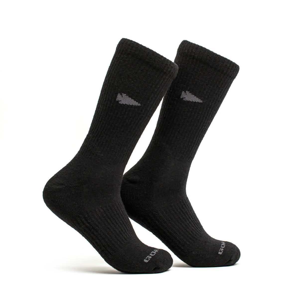 Pair of black crew-length merino wool socks with subtle logo, designed for durable comfort