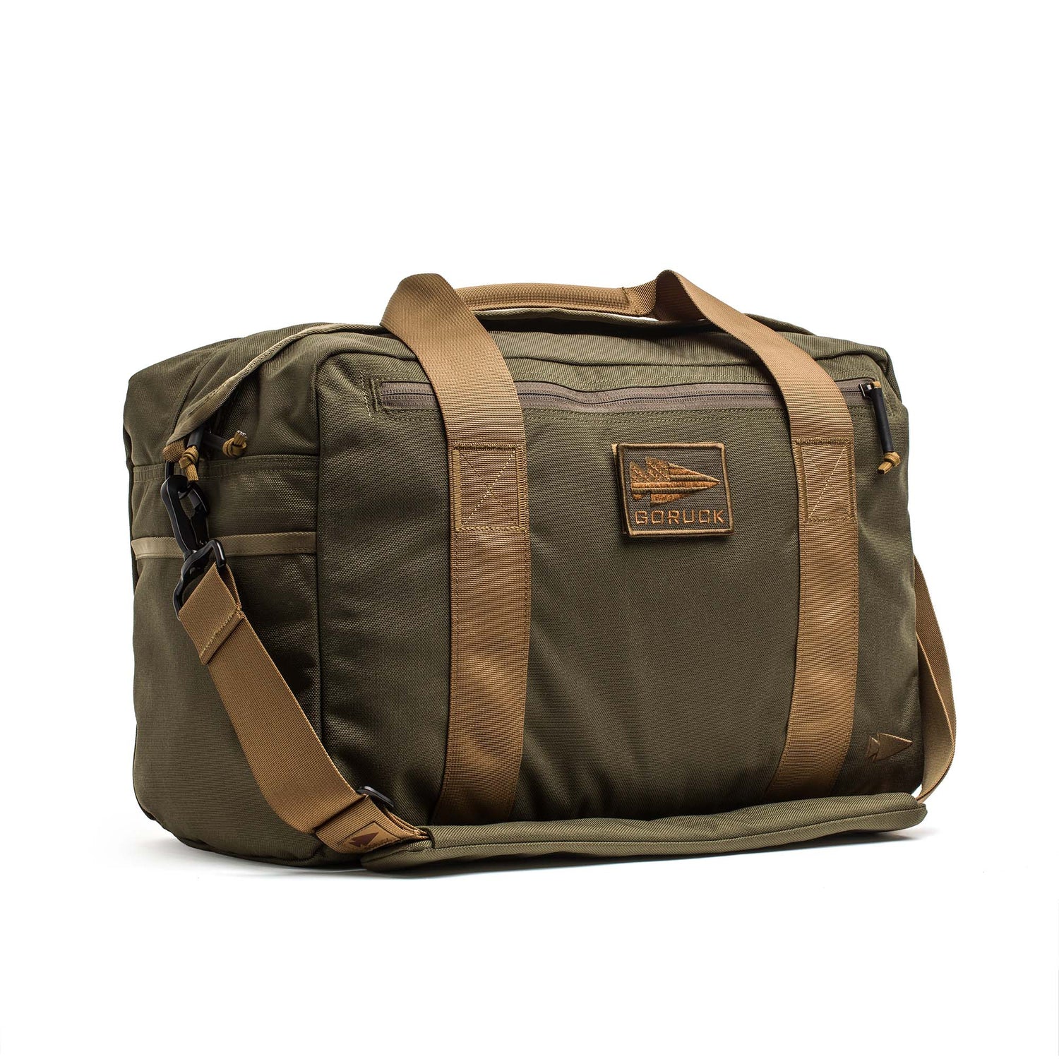 The Kit Bag (Includes Shoulder Strap) features an olive green design with tan straps, a front zipper pocket, and a GORUCK logo patch—a modern update on the classic Special Forces flight bag.