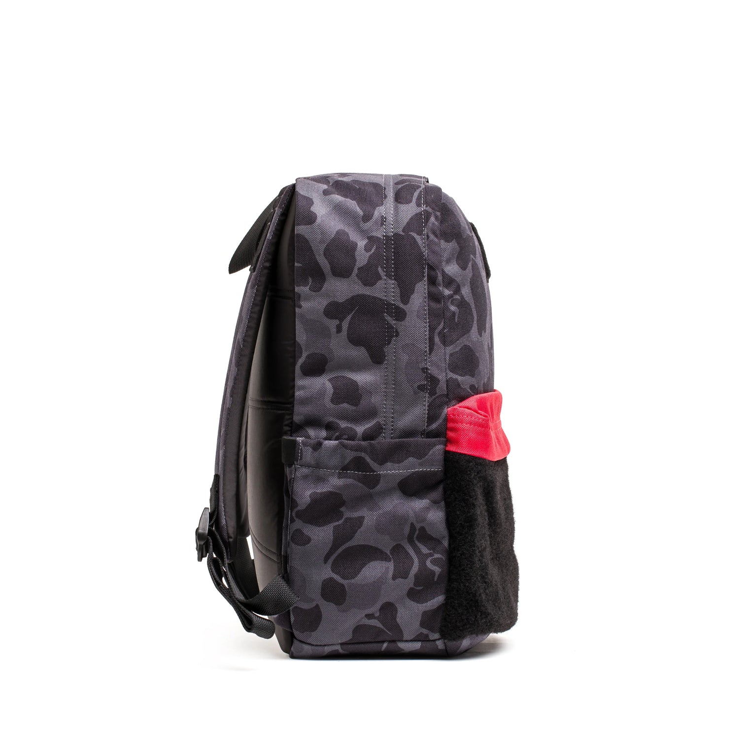 Side view of GORUCK Black Frogskin rucking backpack with gray camouflage and red black pouch