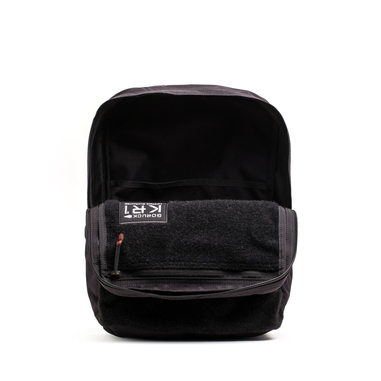 Black GORUCK rucksack with open main compartment and front zipper pocket, durable design for rucking