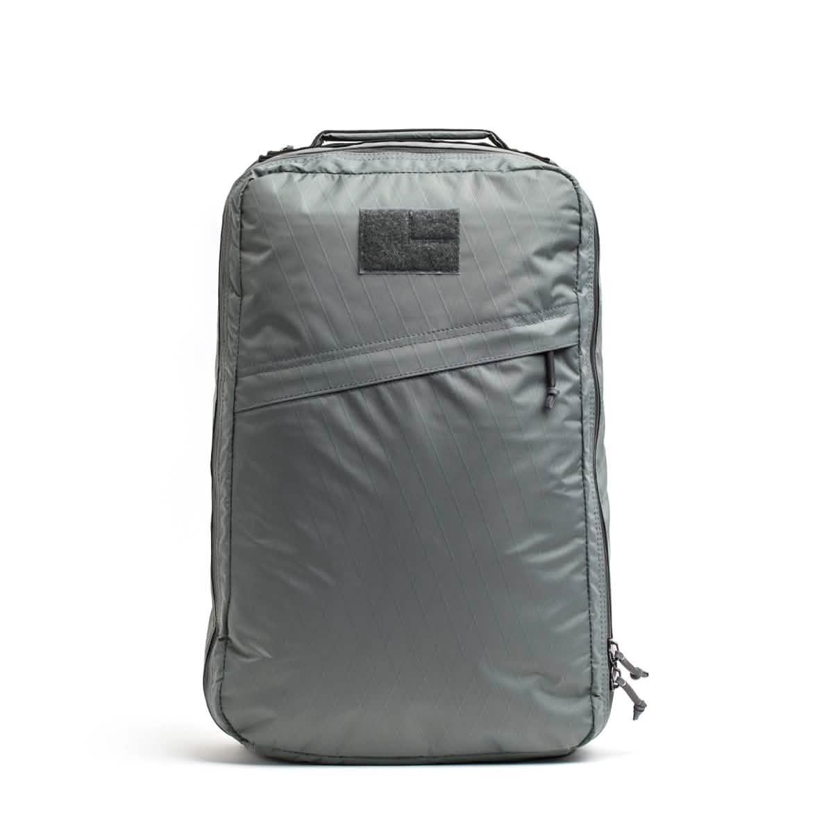 GORUCK charcoal gray rucking backpack with diagonal front zipper pocket and top handle