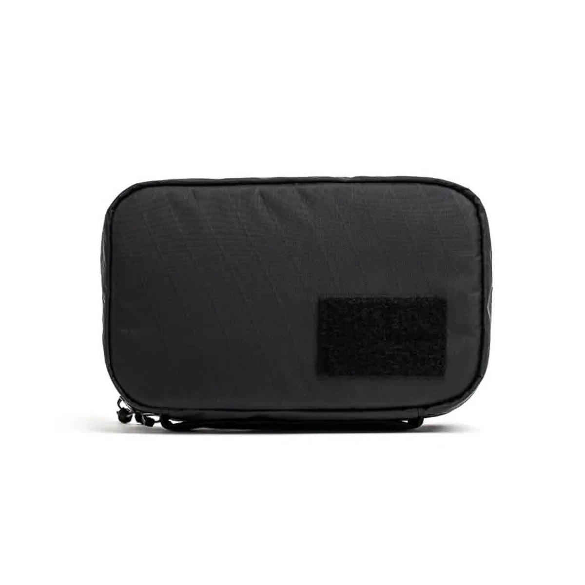 Black rectangular GORUCK Field Pocket with durable fabric and a hook-and-loop patch on front