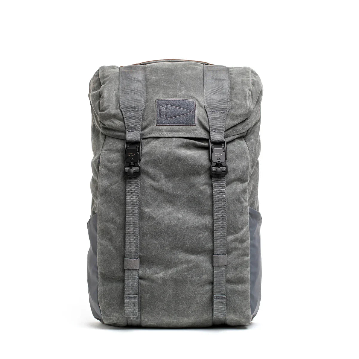 GORUCK rucking backpack in gray waxed canvas with dual front straps and arrow patch
