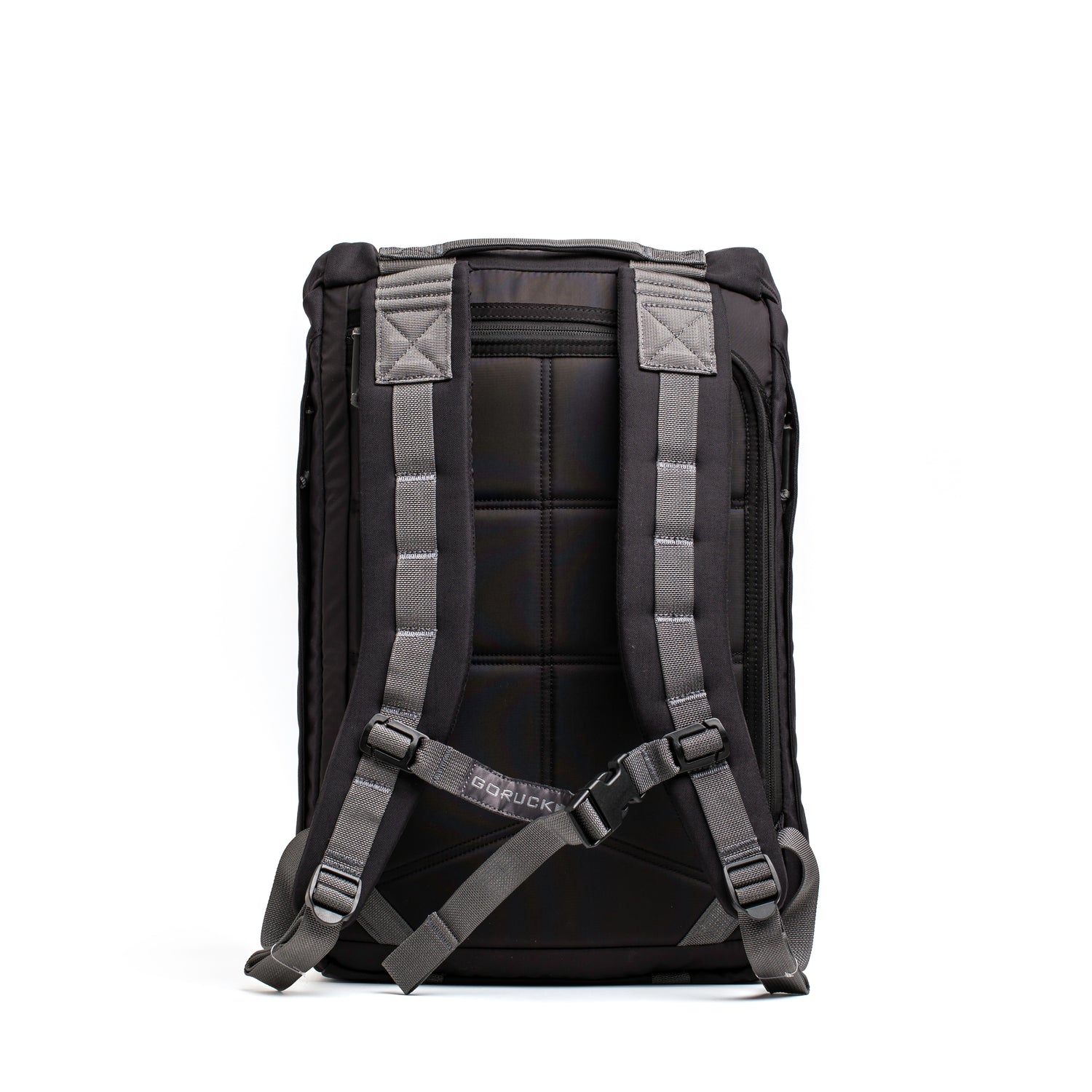 The GORUCK M23 - Cordura rucksack boasts a sleek and modern design in black, crafted from durable materials with gray straps. Its padded sections ensure comfort, and the visible brand logo on the strap adds an element of style. Perfectly showcased against a white background, this rucksack combines practicality with fashion-forward appeal.