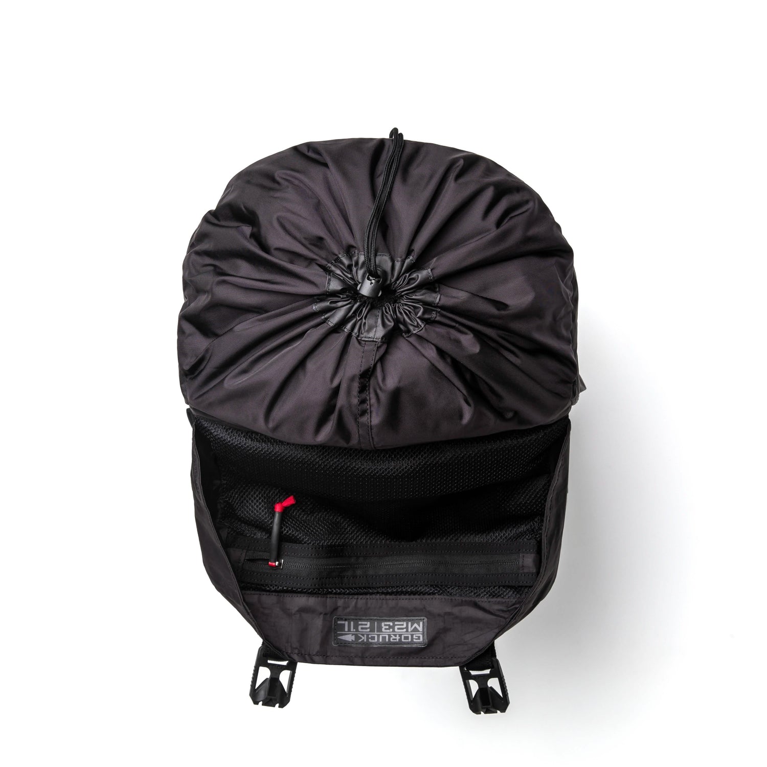 GORUCK black Dyneema rucksack top view with open pocket, visible rugged interior