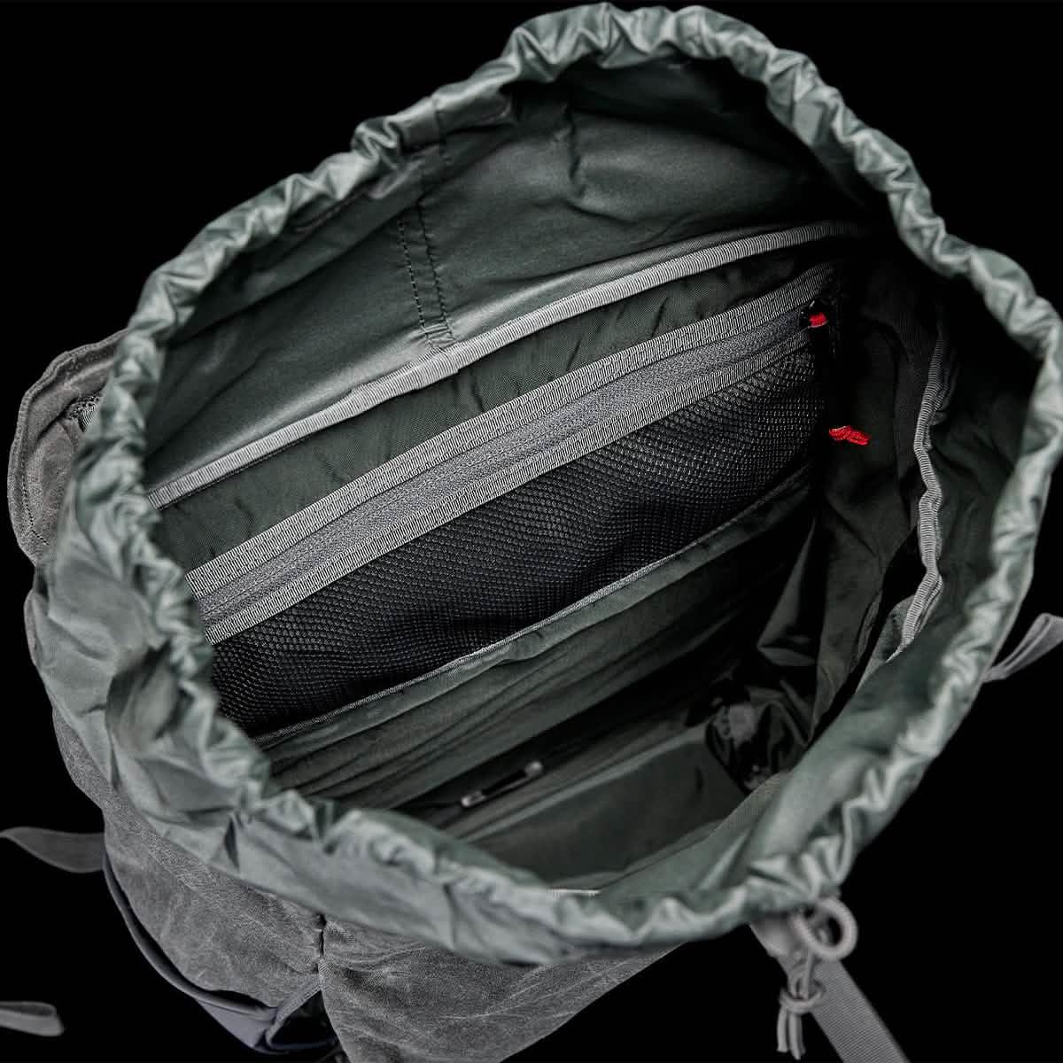 GORUCK rucking backpack interior showing mesh zip pocket and rugged slate fabric
