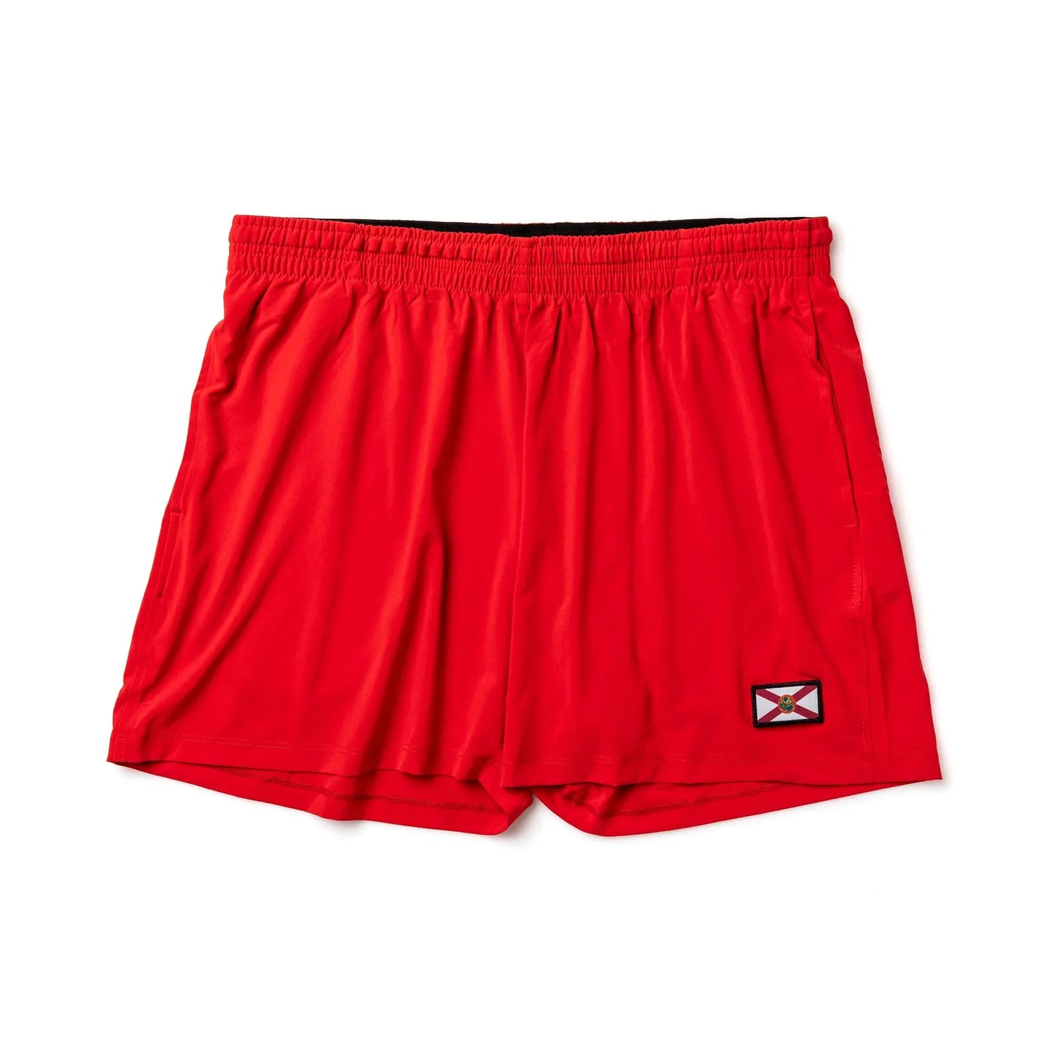Red men's training shorts with elastic waistband and Florida state flag patch on front hem