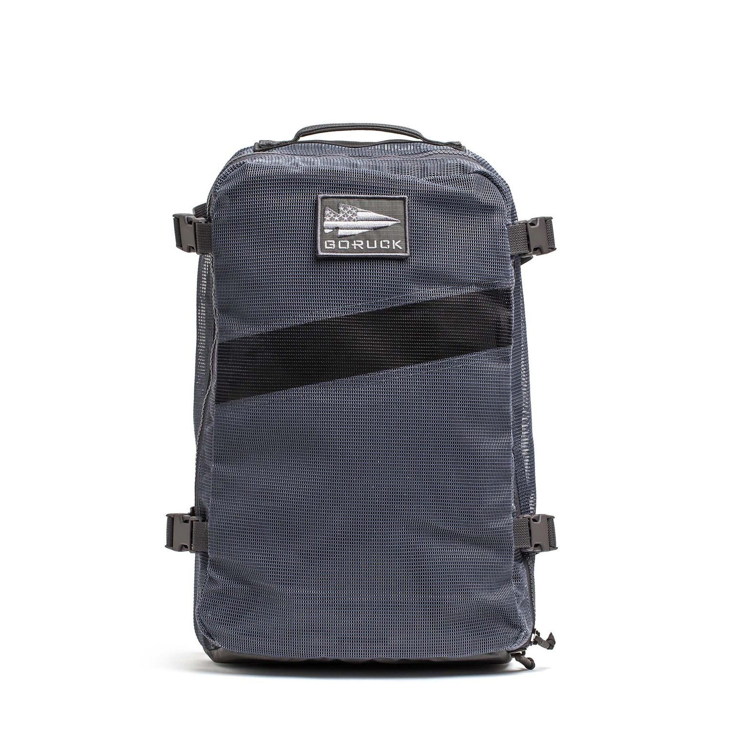 A black Mesh Ruck backpack from GORUCK, featuring quick-drying mesh, a patch, and side buckles, stands upright against a white background.