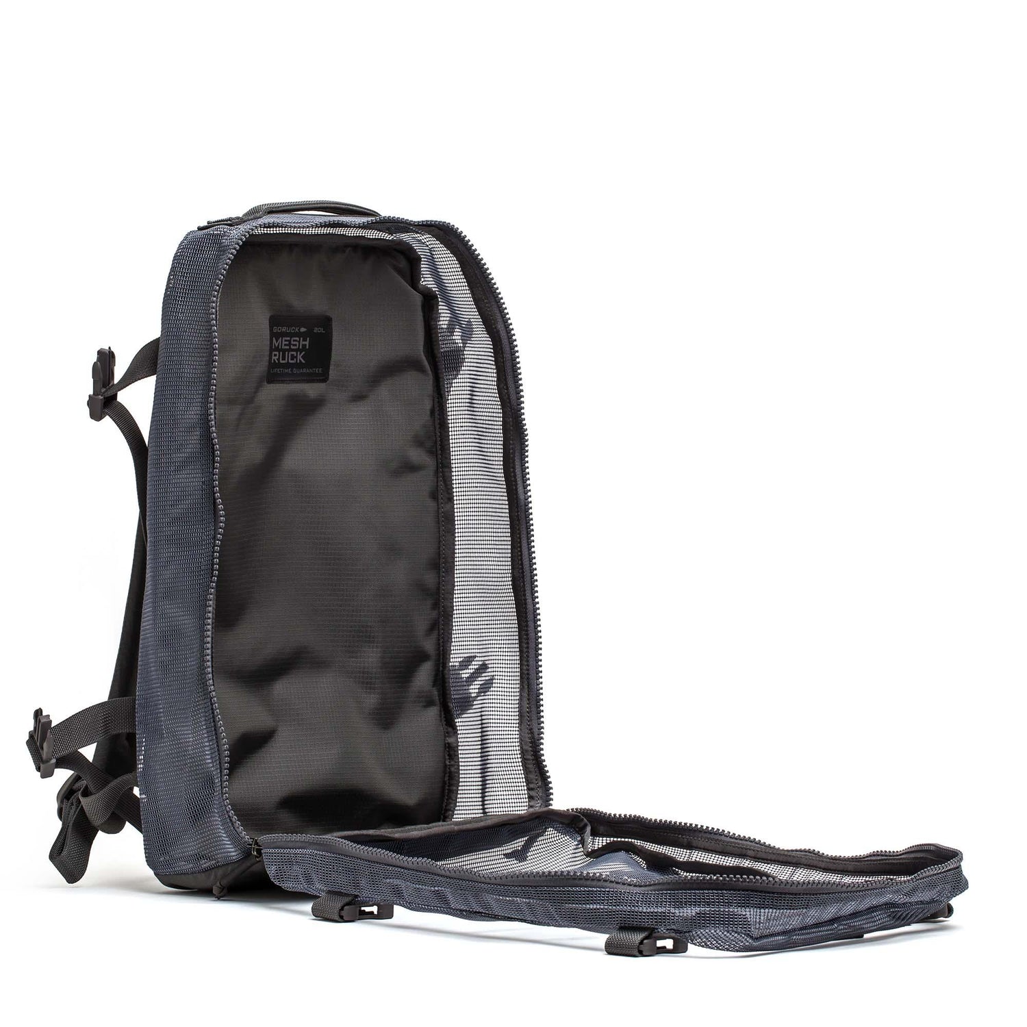 The Mesh Ruck is a gray mesh backpack with its main compartment fully unzipped for easy access, making it an ideal quick-drying backpack or convenient beach bag.