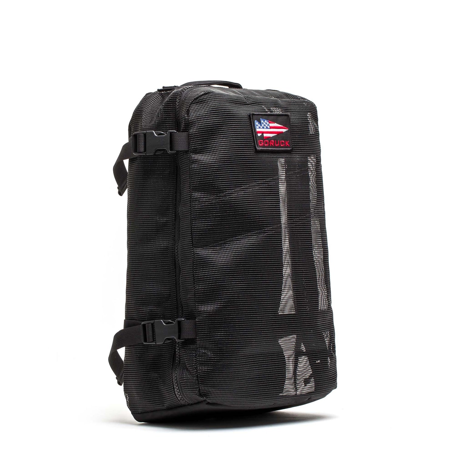 Black GORUCK mesh rucksack with American flag logo patch, side compression straps, and reflective details