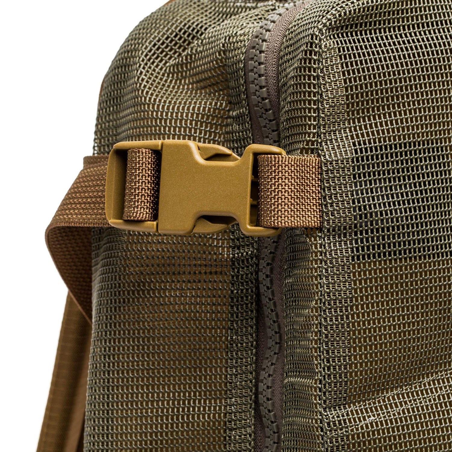Close-up of GORUCK mesh rucksack in ranger green with sturdy sand-colored buckle