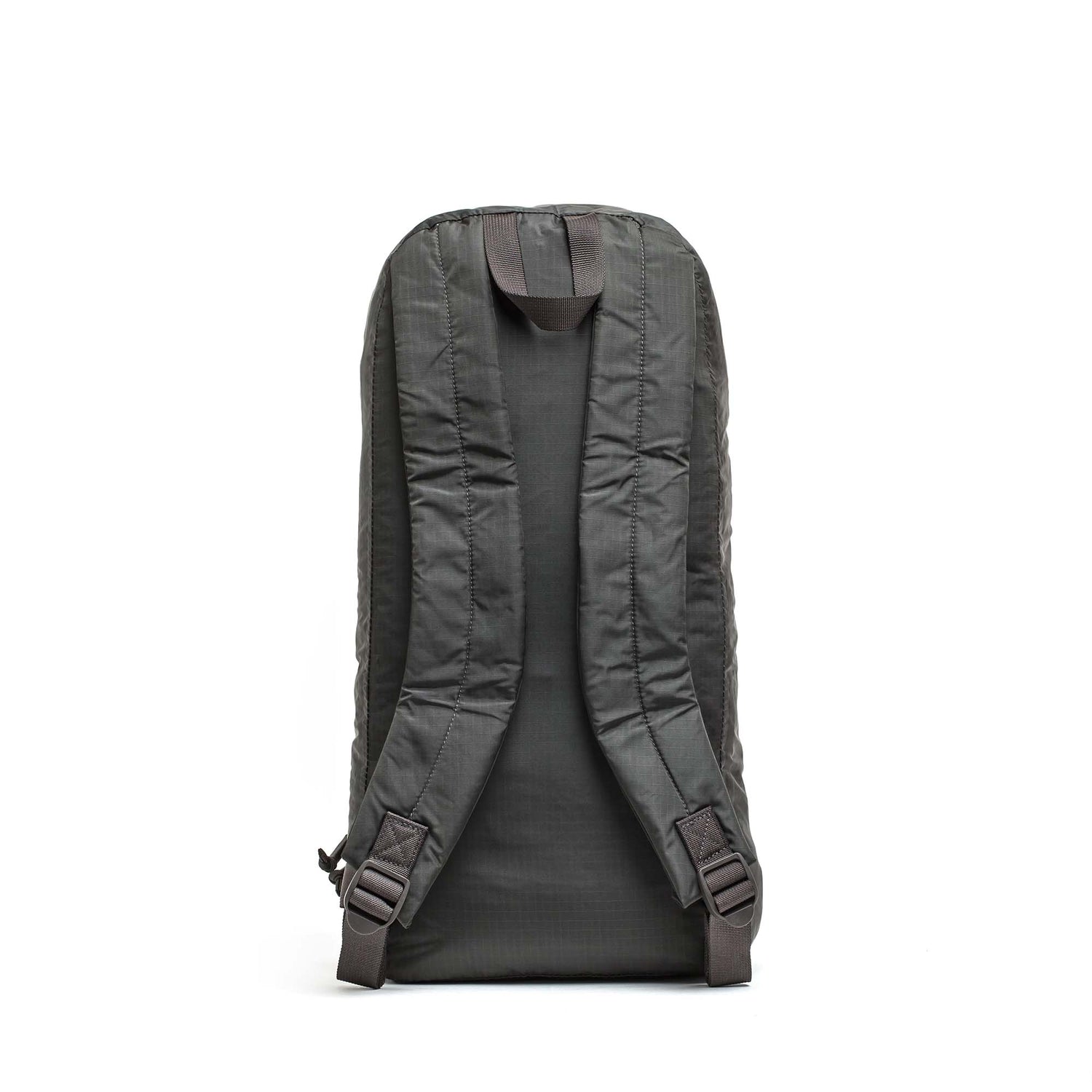 The Packable Bullet Ruck - Ripstop ROBIC® is a black, lightweight day bag shown from the back, featuring padded shoulder straps and a sleek design on a white background.