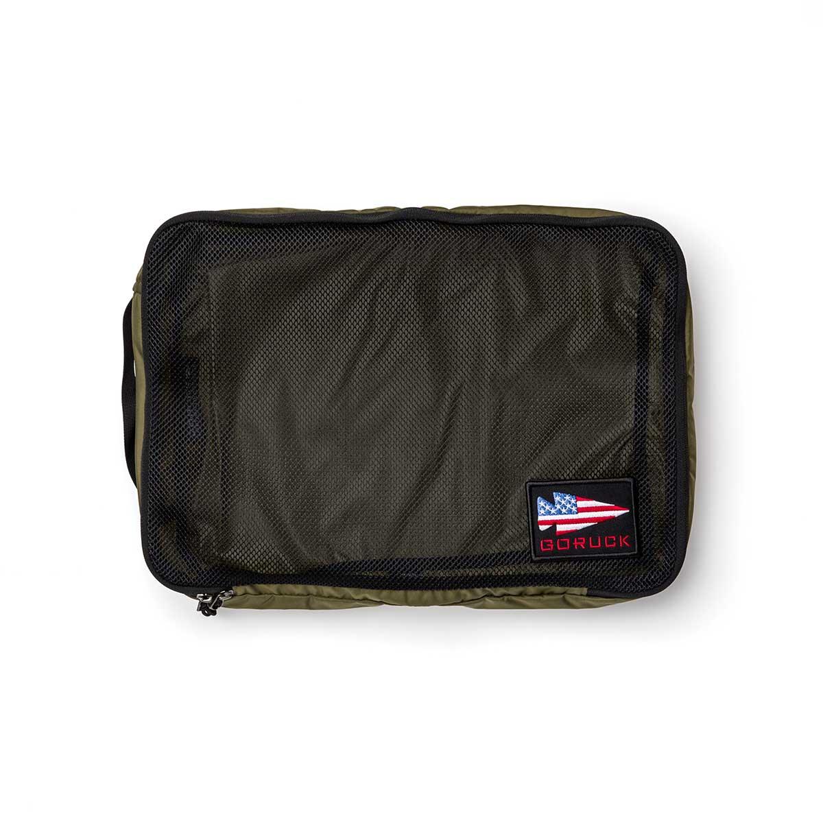 GORUCK Ranger Green packing cube with mesh top and GORUCK logo patch on white background