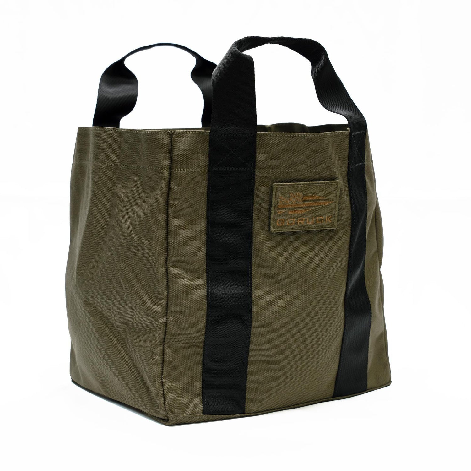 GORUCK durable olive green tote bag with black handles and logo patch on white background