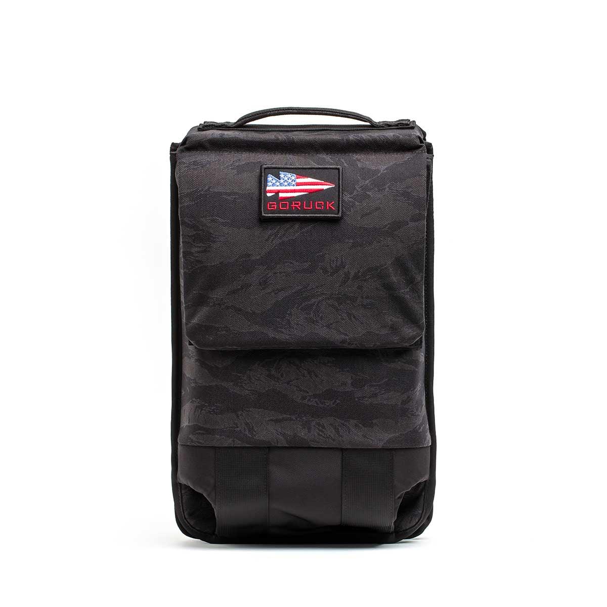 Black GORUCK heavy-duty rucking gear bag with American flag patch, front view, durable design