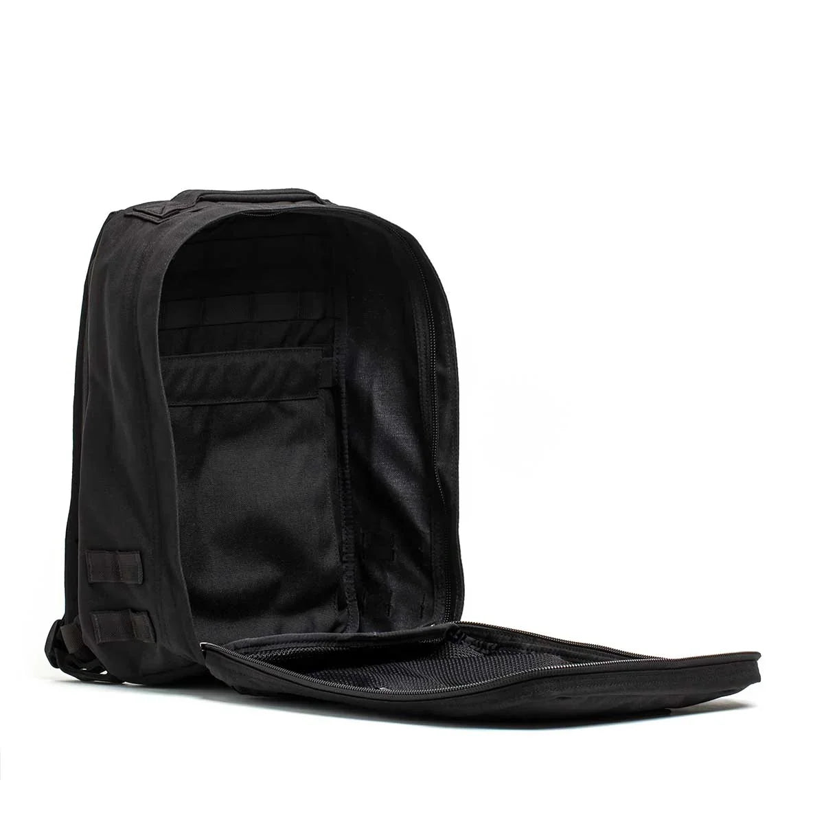 GORUCK black ballistic nylon rucksack open to show spacious main compartment and inner pockets