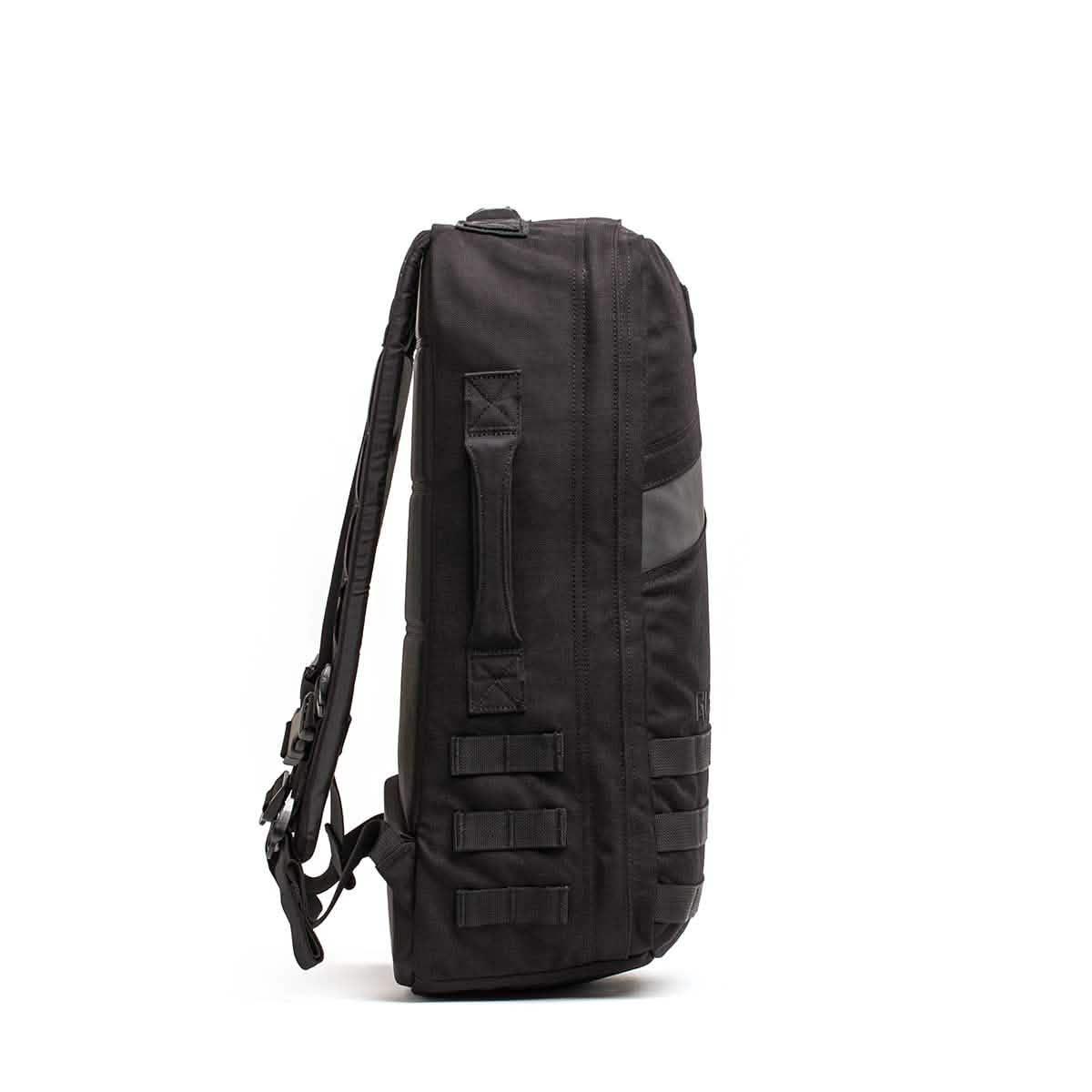 Black GORUCK rucksack side view with padded straps and durable webbing for tough rucking gear