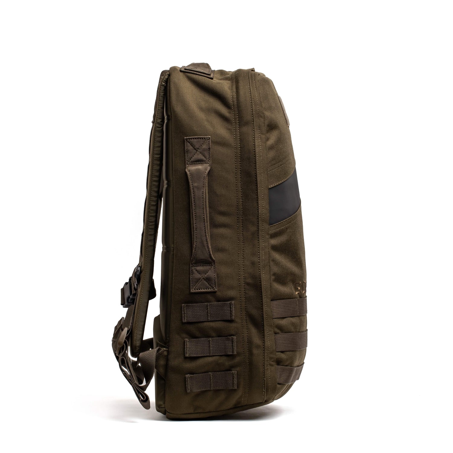 GORUCK Rucker backpack in ranger green with orange interior, side view showing rugged straps and handle