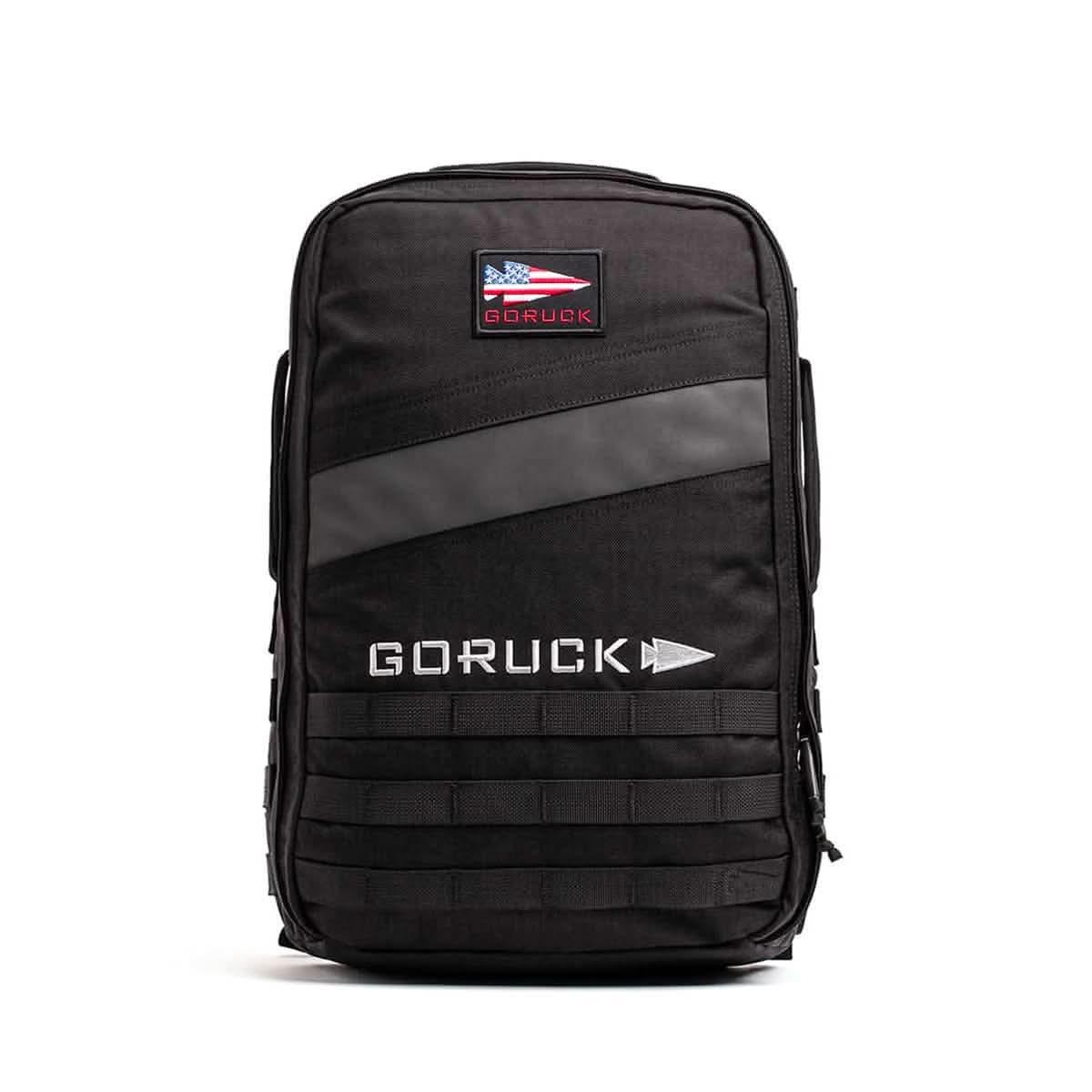 GORUCK Rucker 20L black backpack with American flag patch and MOLLE webbing front view