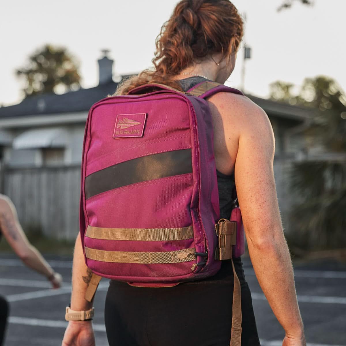 GORUCK Rucker 4.0 15L Baton Rouge backpack worn outdoors during fitness activity