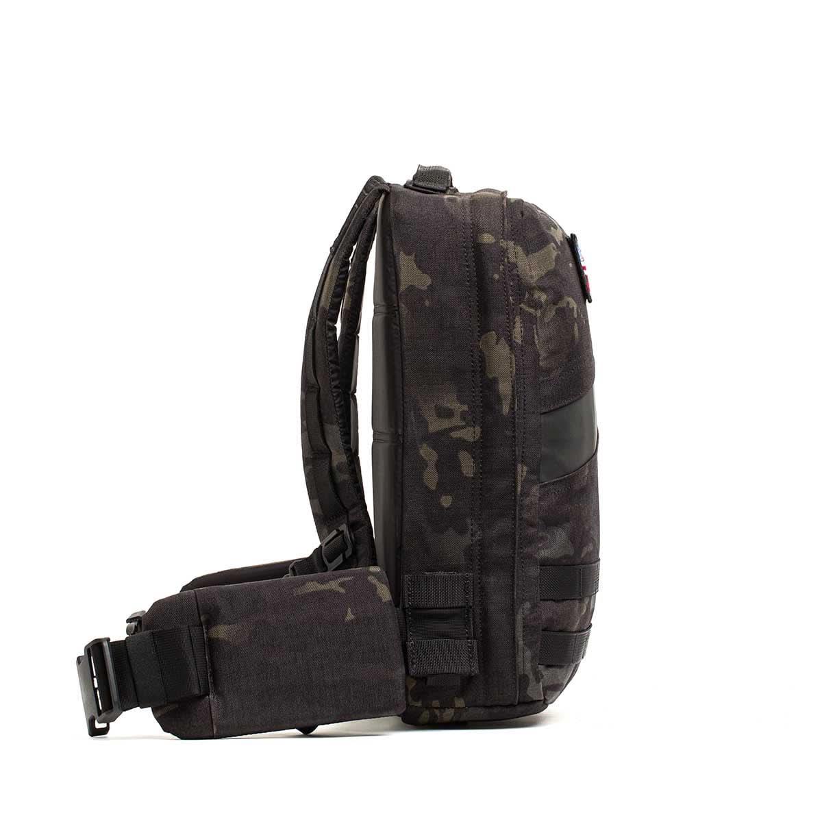 Side view of black Multicam orange GORUCK Rucker 4.0 15L rucksack with padded straps and waist belt