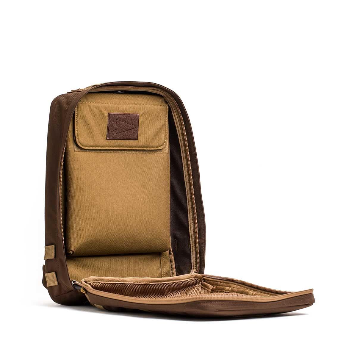 GORUCK Rucker 4.0 Cordura 15L backpack with Java Coyote interior and brown outer accents open to show inner compartments