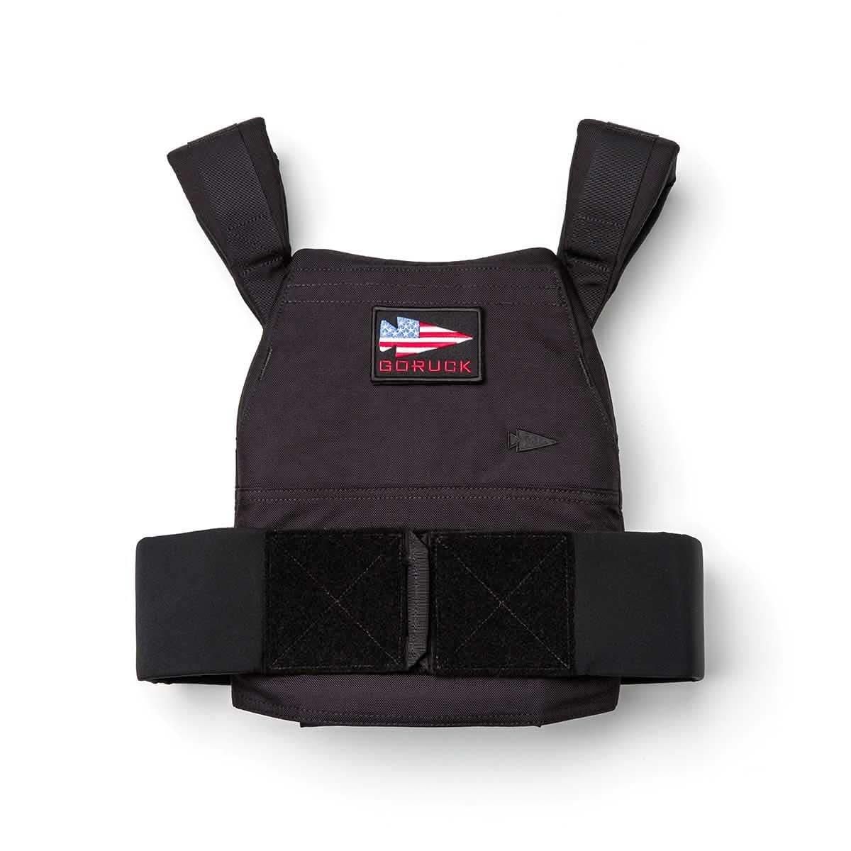 GORUCK black rucking weight vest with American flag patch, front view on white background