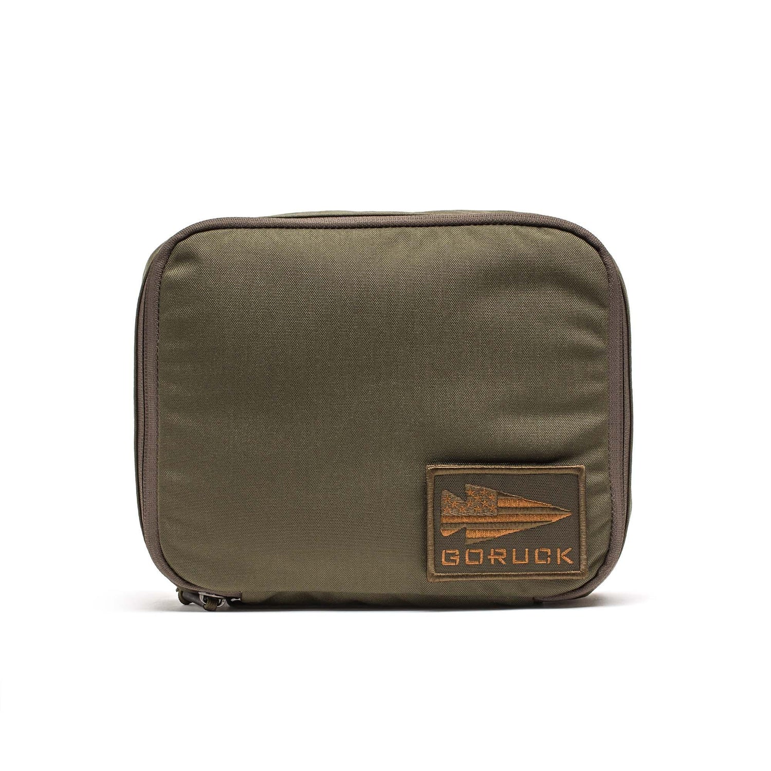 The Shadow Pockets in olive green Cordura feature a GORUCK arrow logo patch on the lower right corner—perfect for organizing your rucksack or using as a compact gear organizer.