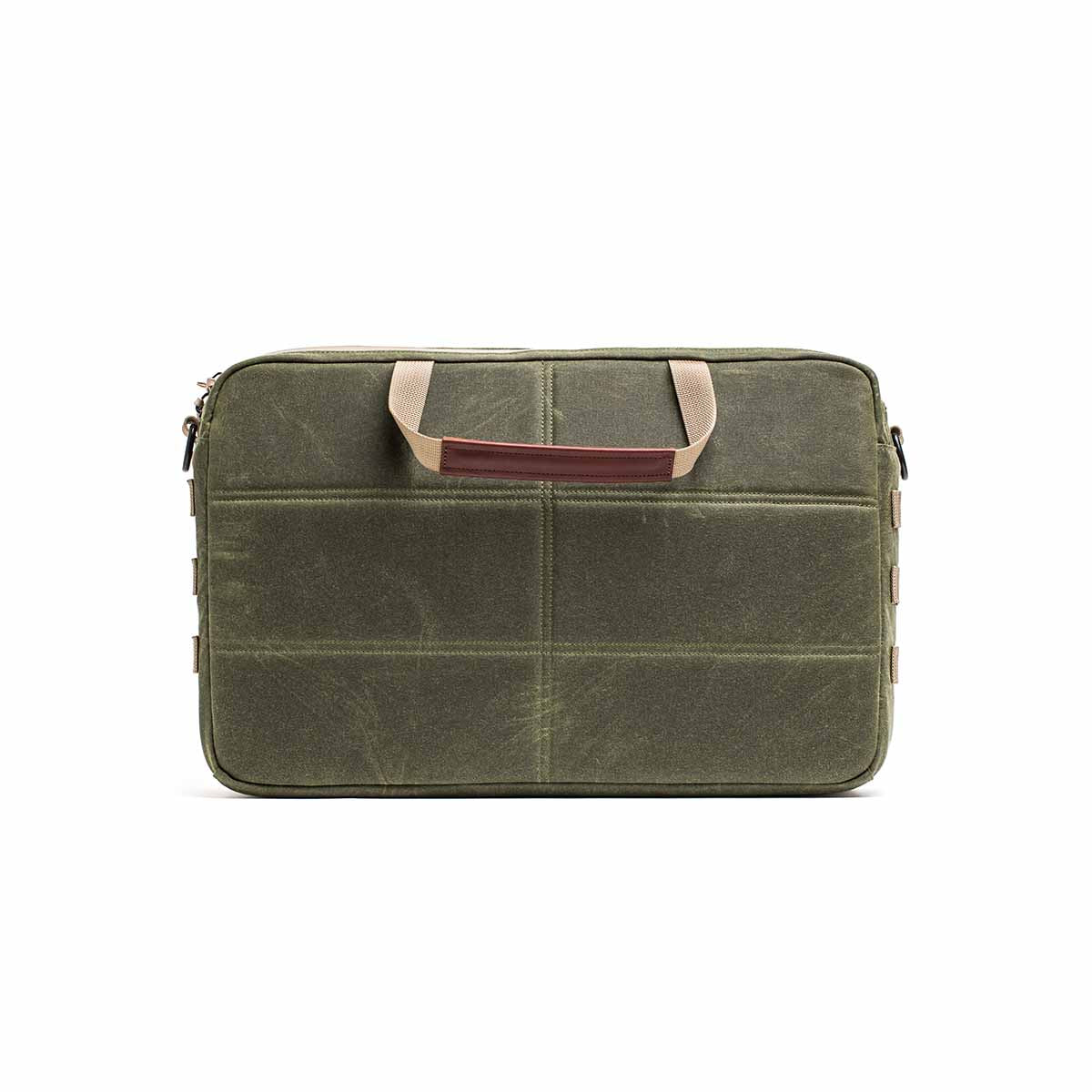 Olive green Shoulder Bag - Waxed Canvas by GORUCK, rectangular shape with Martexin wax finish, tan handles, and brown accent—ideal for asymmetrical carry. Shown on a white background.