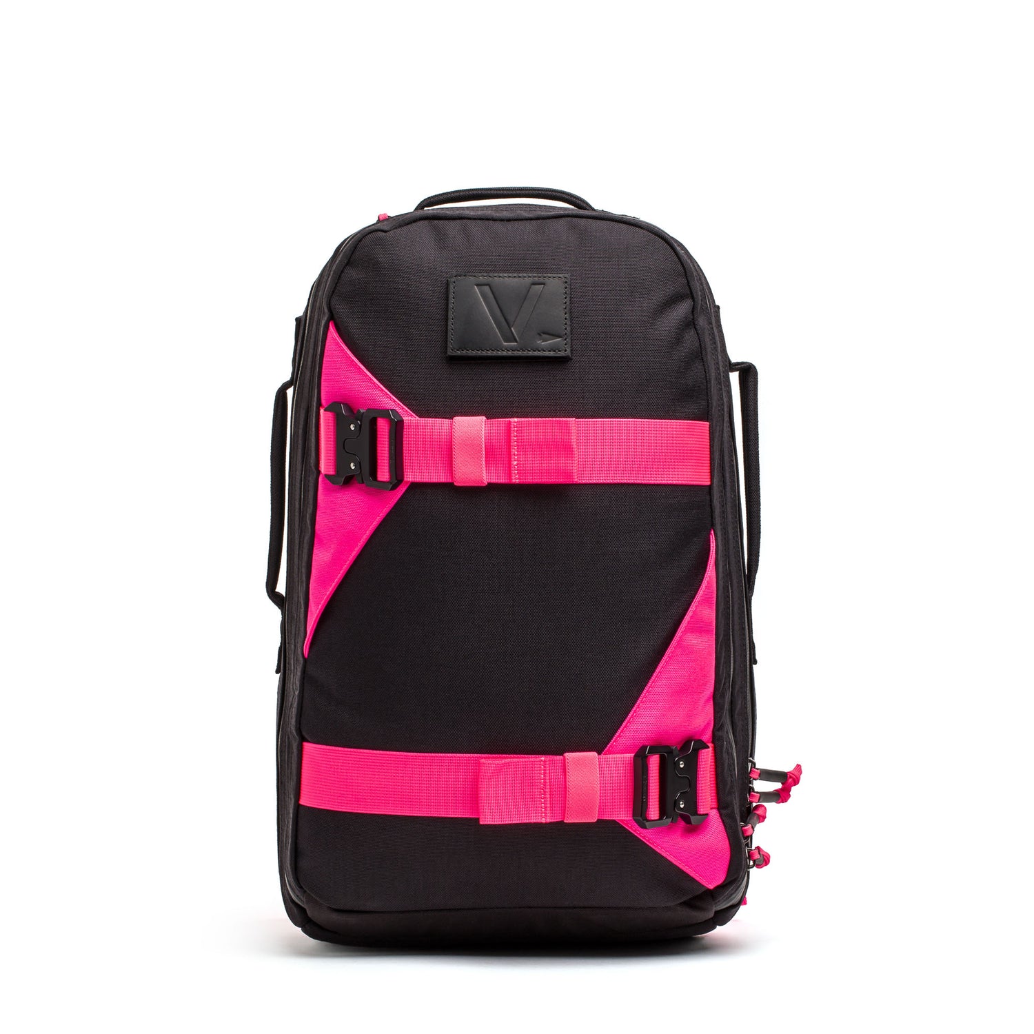 The Skate Ruck backpack features bright pink straps, front buckles, a side handle, a rectangular logo patch on top, and a durable laptop compartment—making it the perfect go-to EDC bag.