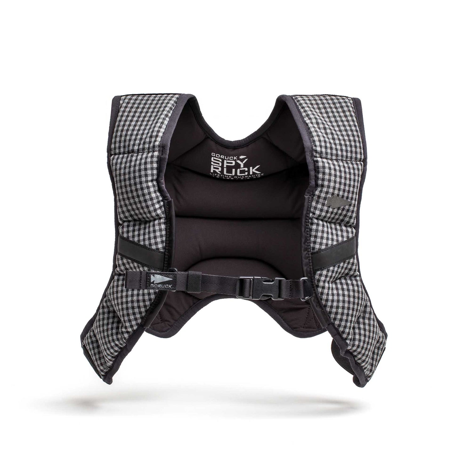 The Spy Ruck | Women's Weighted Vest is a black and white checkered padded vest with buckles and the