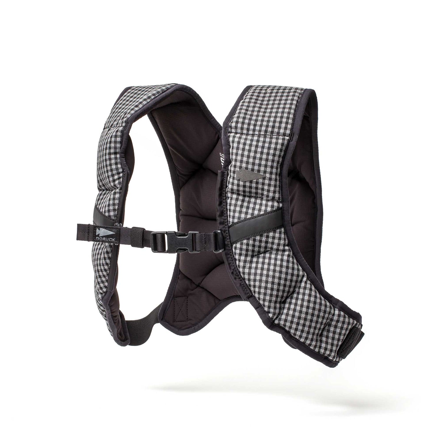 The Spy Ruck | Women's Weighted Vest is a padded, black and white checkered harness with adjustable straps and buckle, ideal for women. Shown on a white background.