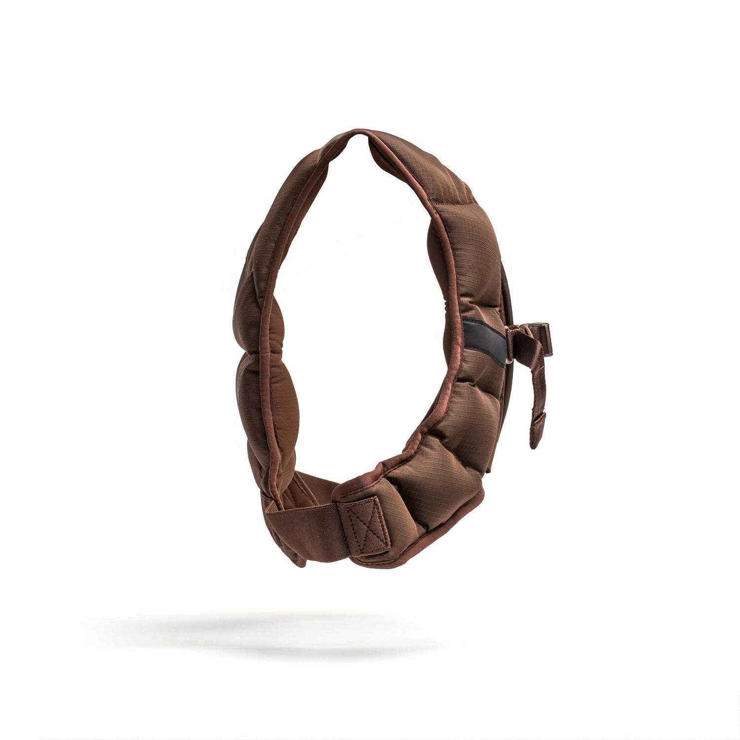 A brown padded headband with an adjustable strap floats against a white background—perfect for pairing with your Spy Ruck | Women's Weighted Vest.