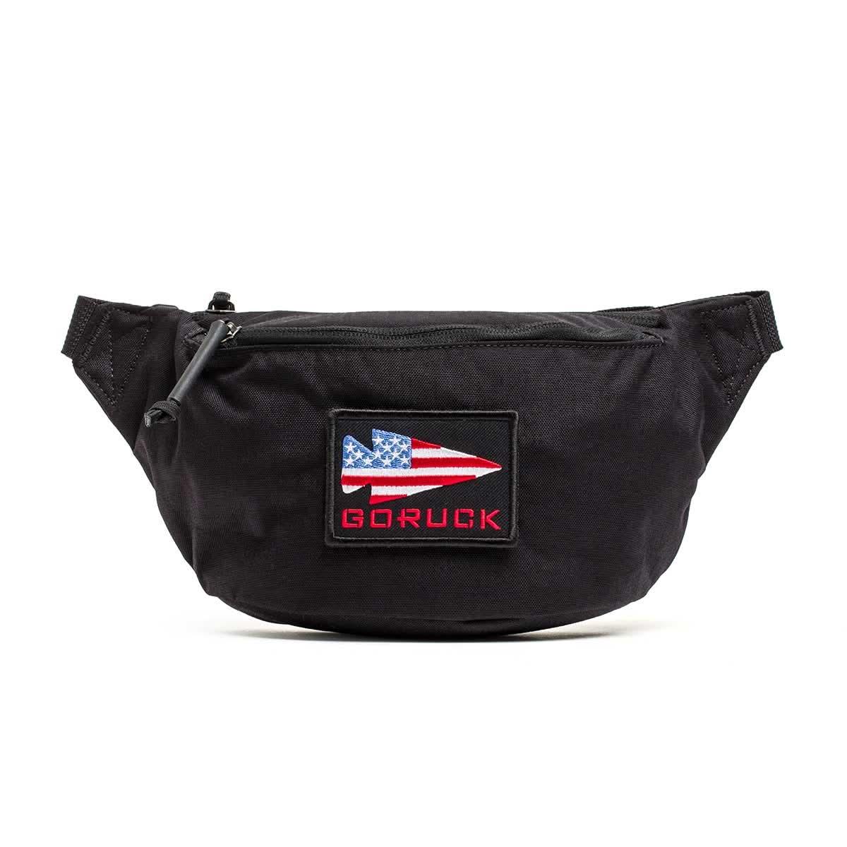 GORUCK black tactical fanny pack with American flag patch and zippered front pocket