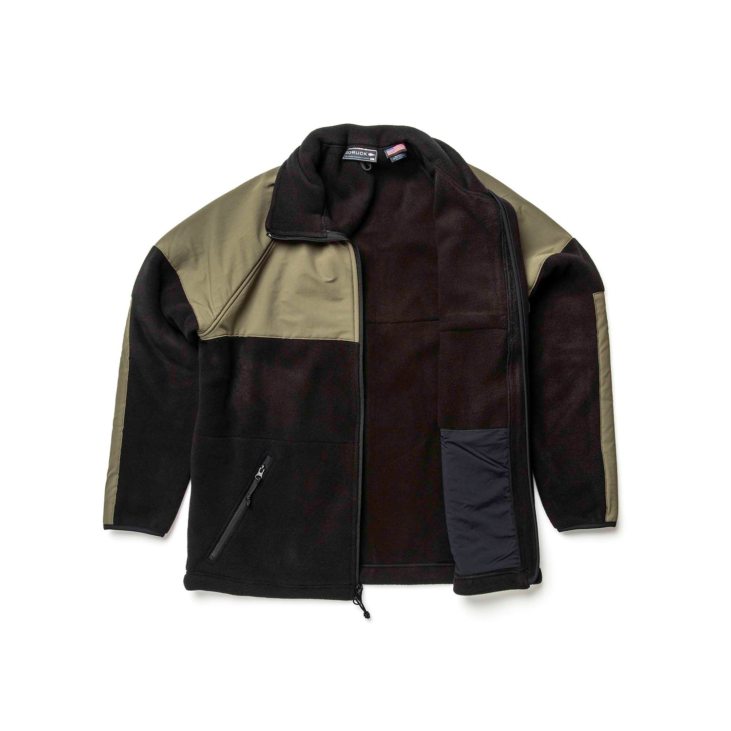 The Men’s Task Force Dagger Jacket - Polartec Fleece is a black and olive green jacket with a high collar and zippered pocket, laid flat. This performance outerwear provides warmth and durability.