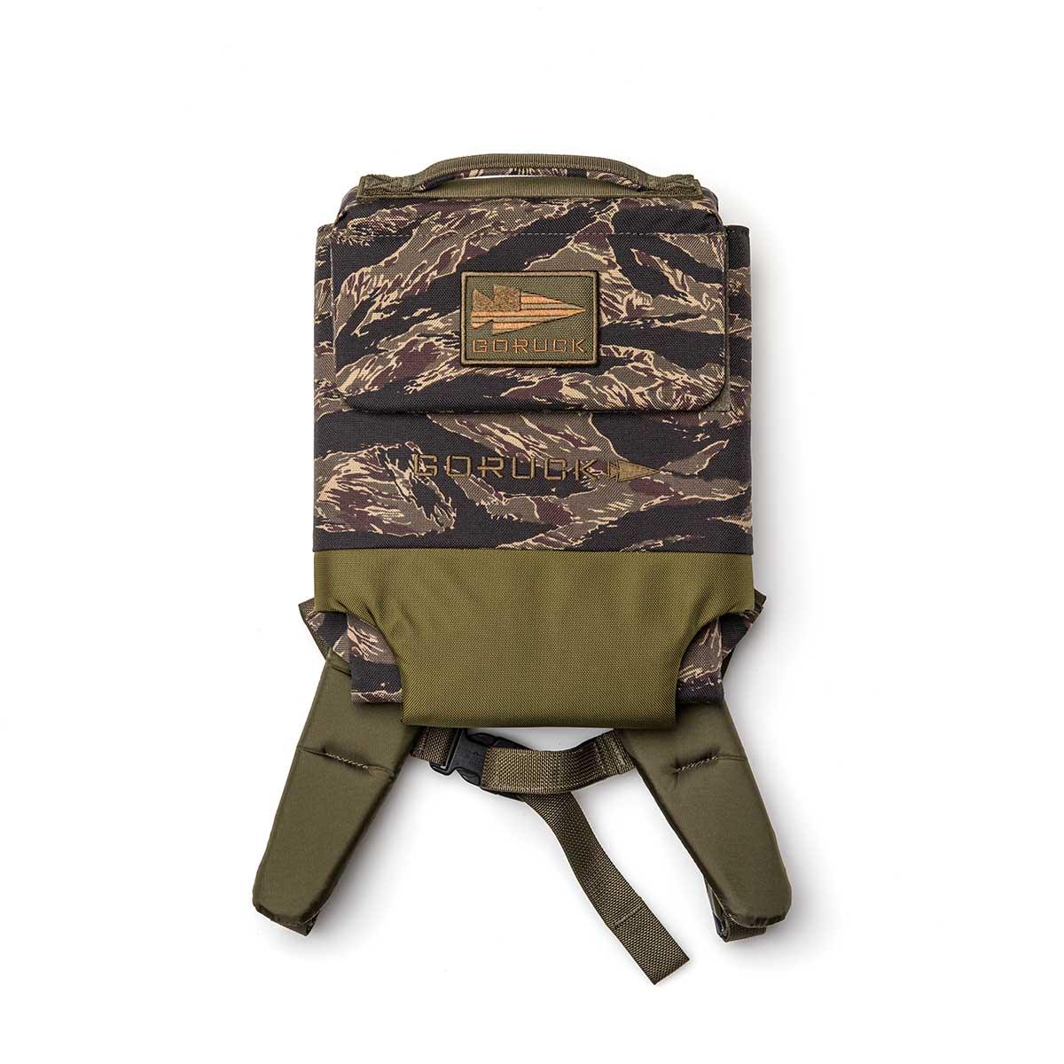 GORUCK tiger stripe camo rucking backpack with olive green straps on white background
