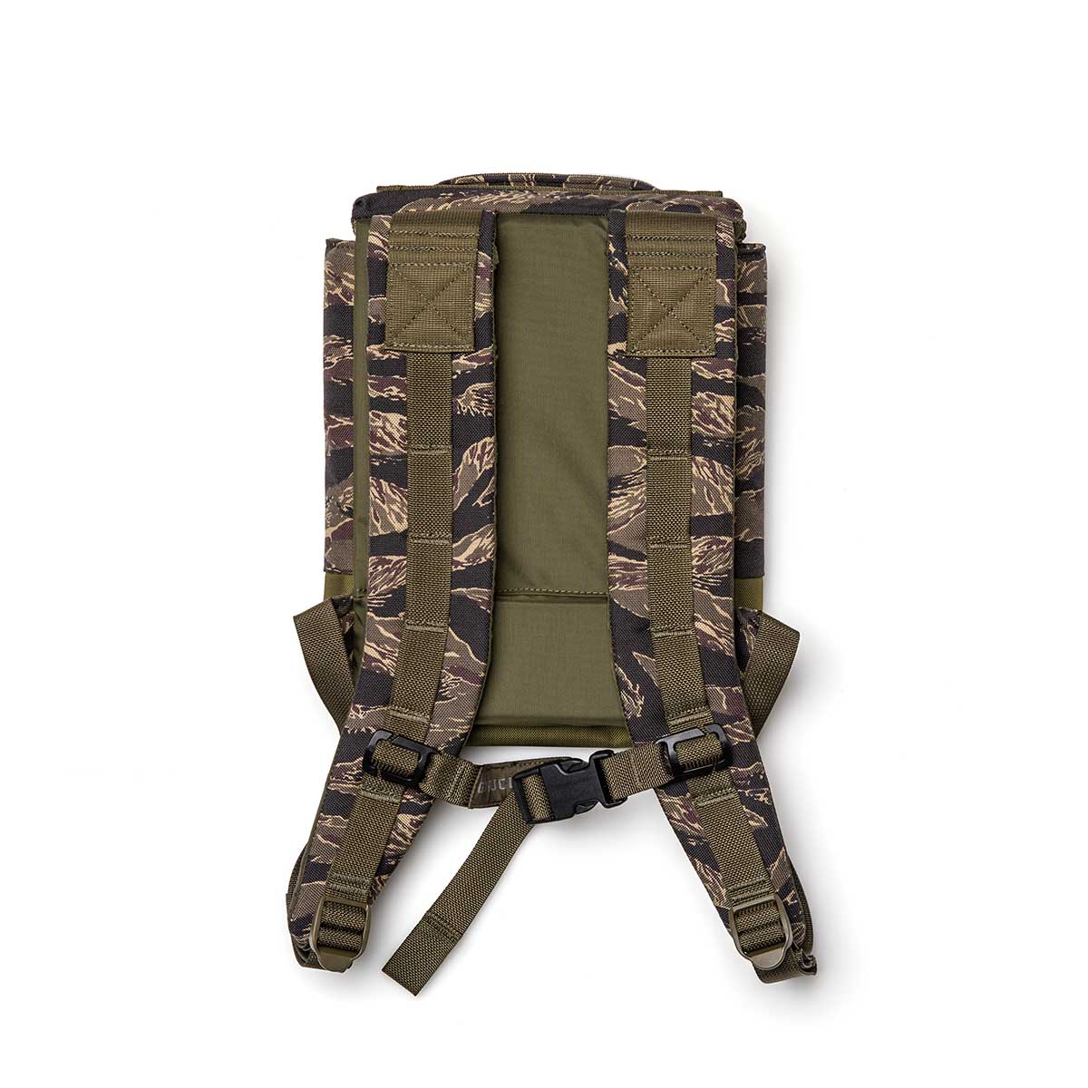 The Ruck Plate Carrier 3.0, shown from the back in camouflage, features padded straps, a green mesh panel, and durable ballistic nylon construction.
