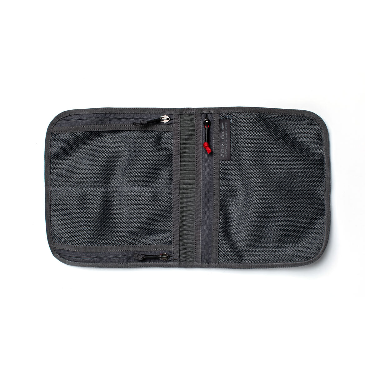 The Wire Dopp, a gray zippered mesh travel pouch, opens flat to reveal two compartments—ideal for organized carrying of travel essentials. Crafted from durable CORDURA for long-lasting use. Perfect on a white background.