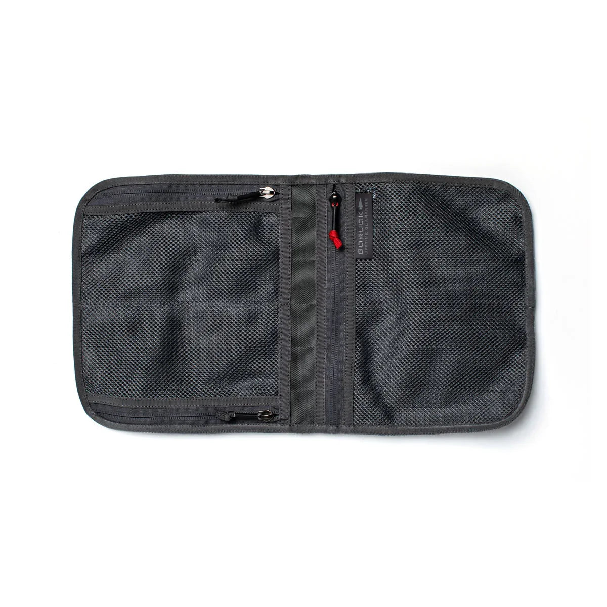 The Wire Dopp is a gray, zippered mesh travel organizer with two compartments, shown open on a white background—ideal as an EDC pouch or cable storage bag.