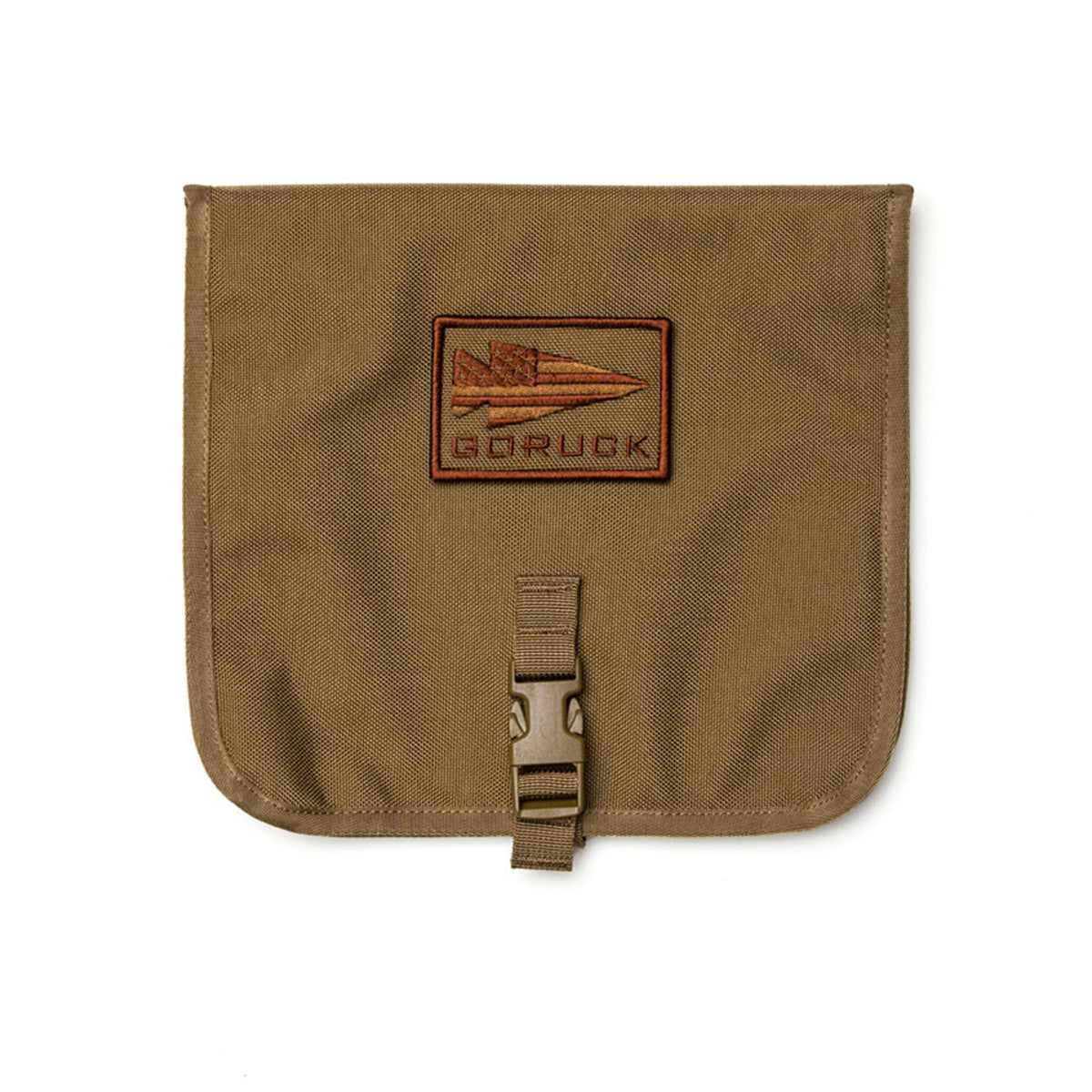 The Wire Dopp is a brown, durable CORDURA pouch with a patch and buckle closure—ideal as a charging cable organizer or for travel EDC essentials—shown against a white background.