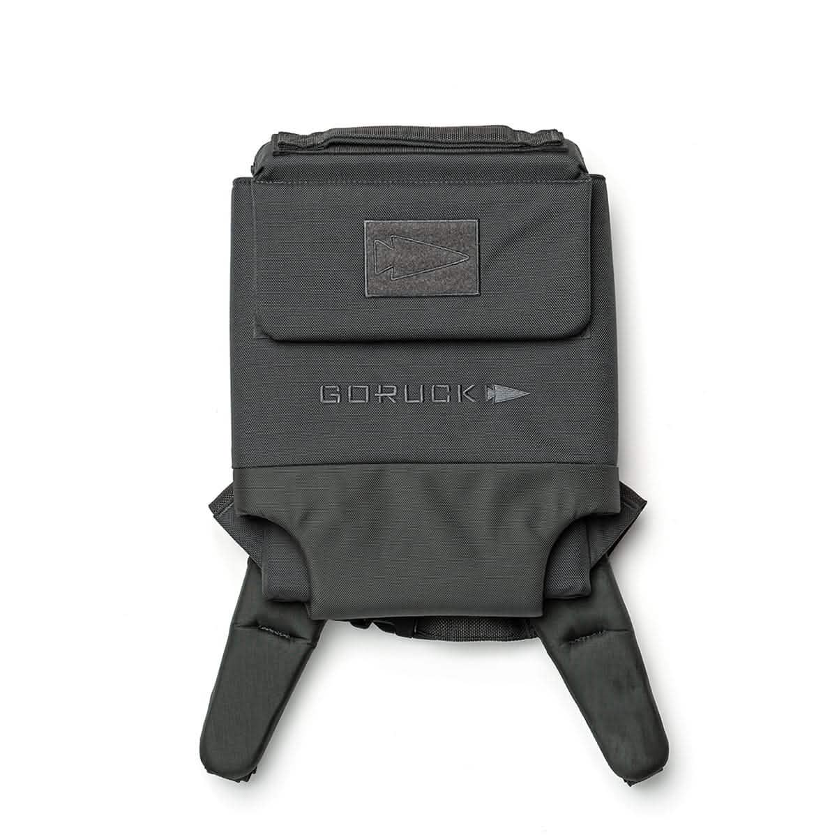The Ruck Plate Carrier 3.0 by GORUCK is a black tactical vest featuring Velcro straps and the brand's embroidered logo on the front. Constructed from durable 1000D CORDURA, it offers multiple pockets and ergonomic lumbar support for superior comfort and practicality.
