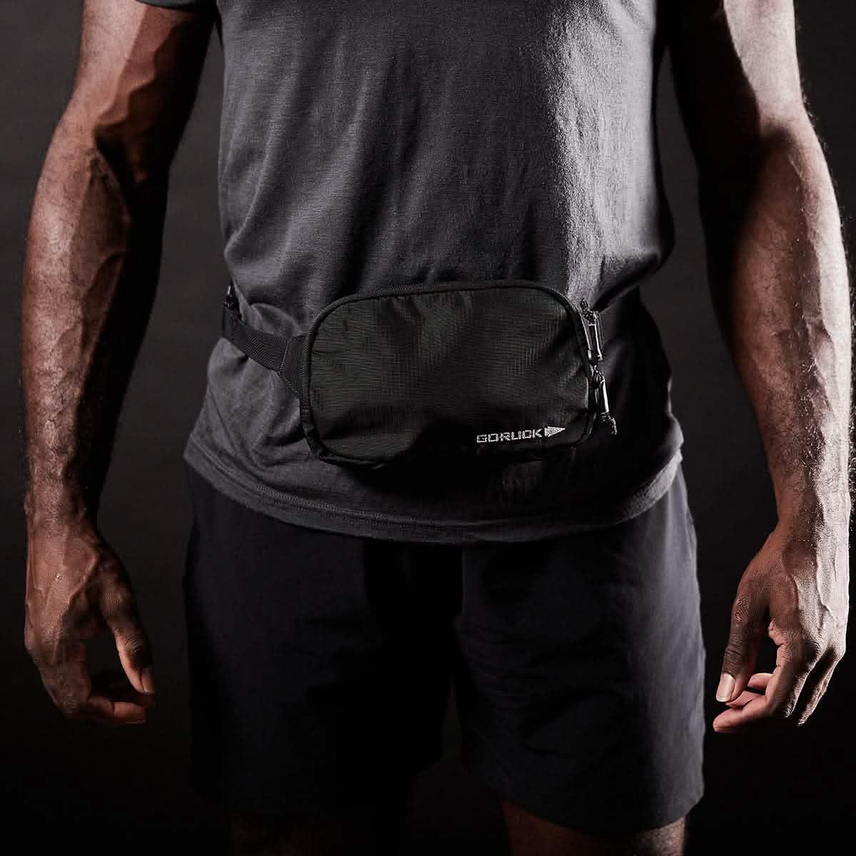 GORUCK black belt bag worn by athlete, durable rucking gear for active lifestyle