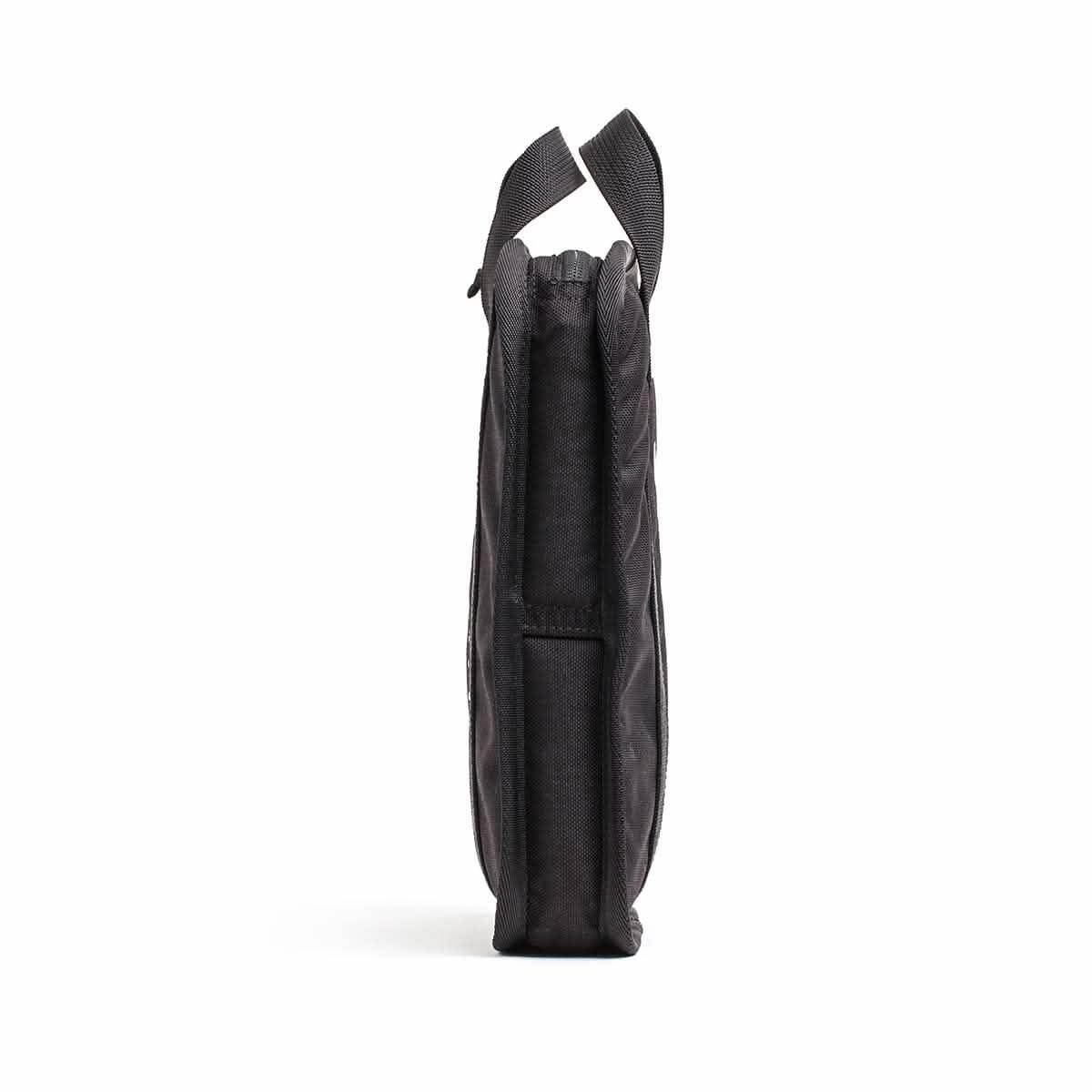 Side view of black GORUCK rucking gear pouch on white background