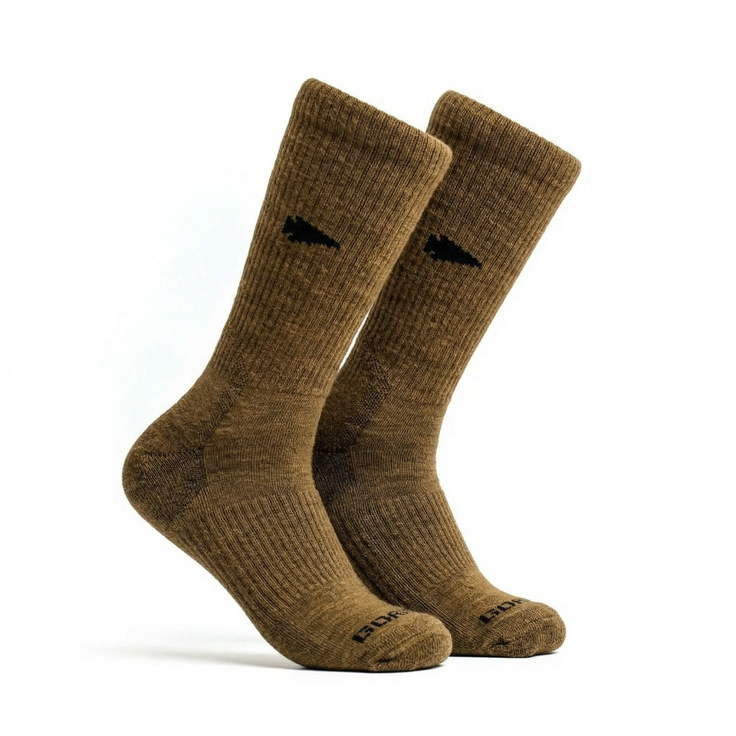 The Merino Challenge Socks - Crew are brown Merino wool crew socks with a black arrow design and text near the toes, shown on a white background—ideal boot socks that come with a lifetime guarantee.